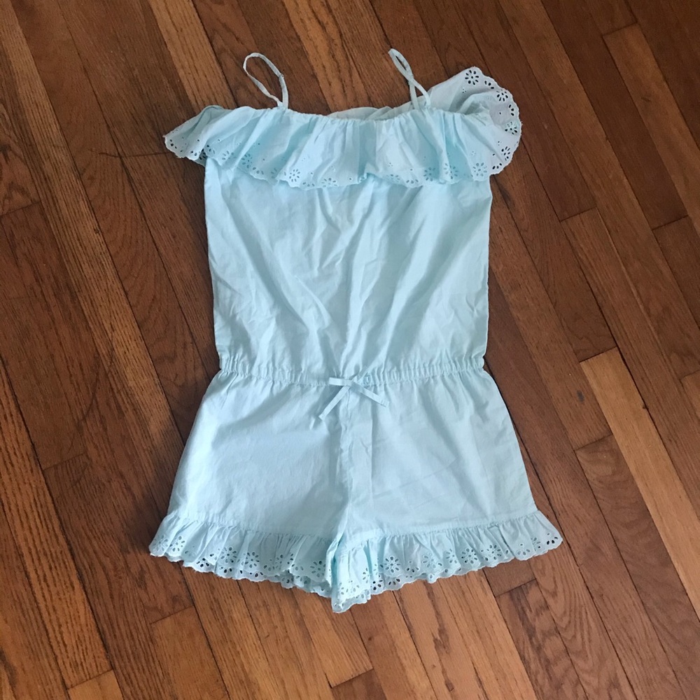 Light blue,sleeveless big girl romper.